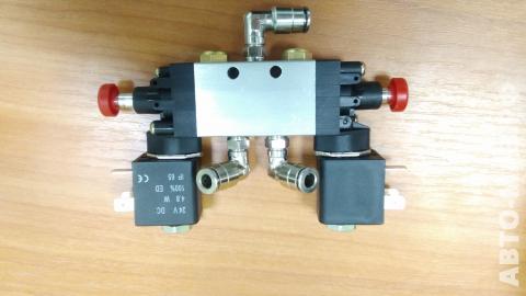 Пневмораспределитель упр дверьми АМАЗ 242-689200